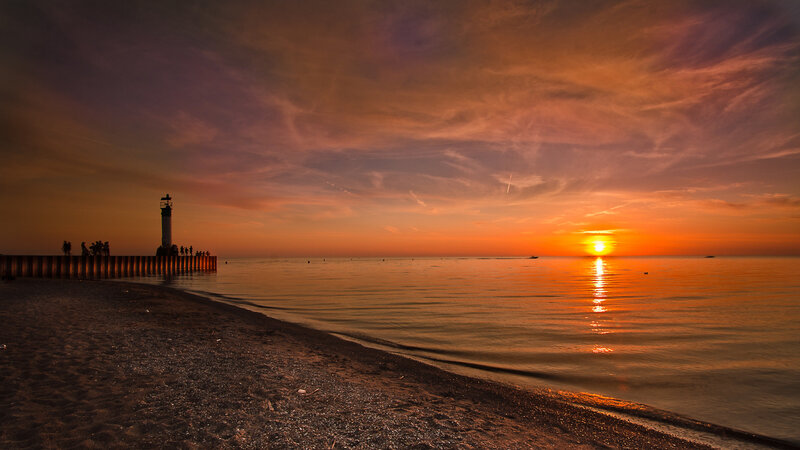 Lighthouse at Sunset — Orange, Serene, Photograph, Beach