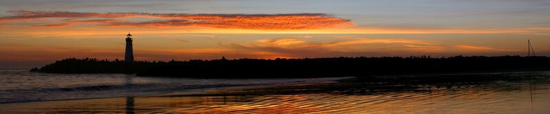 Lighthouse at Sunset — Orange, Serene, Photograph, Ocean, Sky, Beach, Yellow, Black