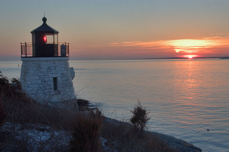 Lighthouse at Sunset — Orange, Serene, Photograph, Ocean, Sky, Vegetation