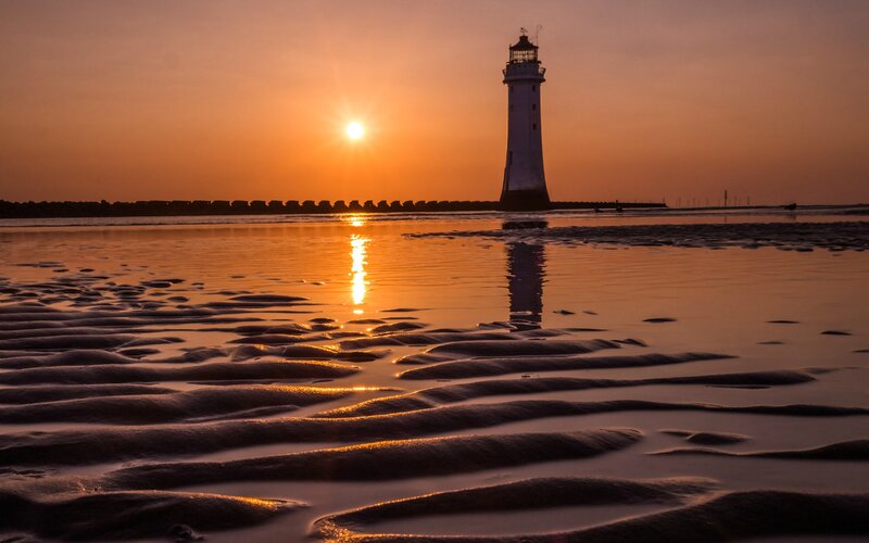 Lighthouse at Sunset — Orange, Serene, Photograph, Sun, Beach