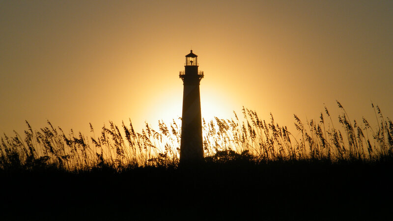 Lighthouse at Sunset — Orange, Serene, Photograph, Sun, Grass