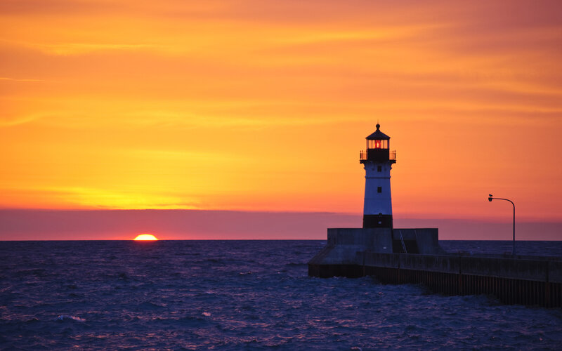 Lighthouse at Sunset — Orange, Serene, Photograph, Sun, Ocean, Pier, Purple