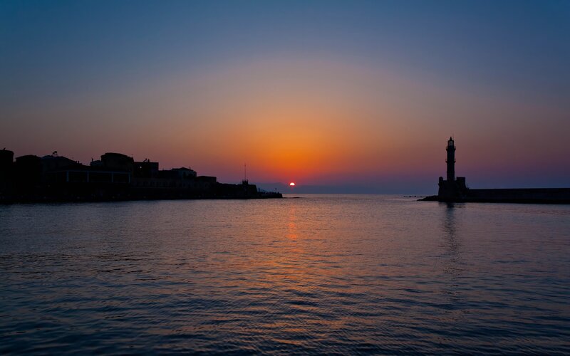Lighthouse at Sunset — Orange, Serene, Photograph