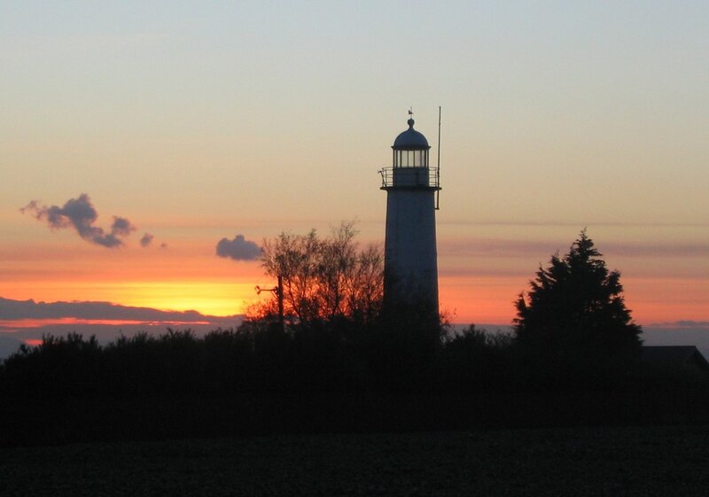 Lighthouse at Sunset — Orange, Serene, Photograph, Trees