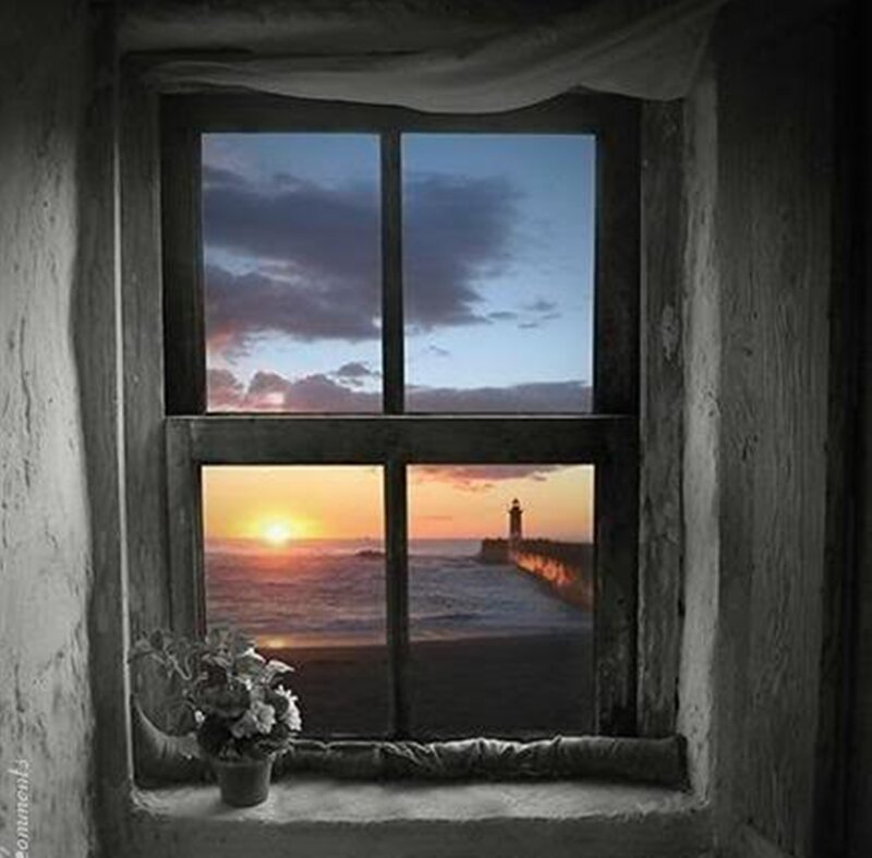 Lighthouse at Sunset — Orange, Serene, Photograph, Window