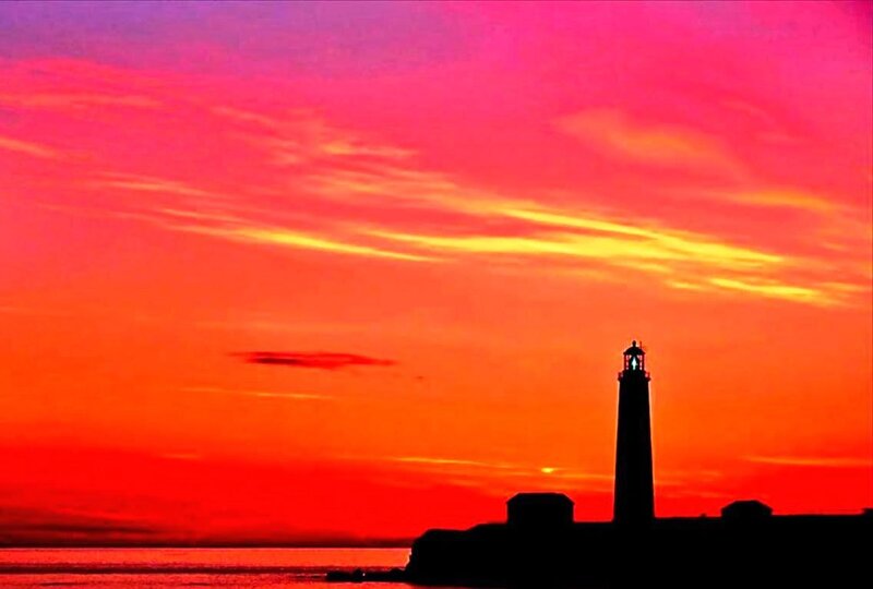 Lighthouse at Sunset — Red, Dramatic, Photograph, Sky, Sea