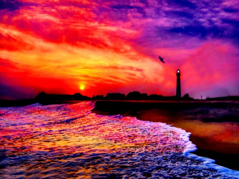 Lighthouse at Sunset — Red, Dramatic, Photograph, Sun, Bird