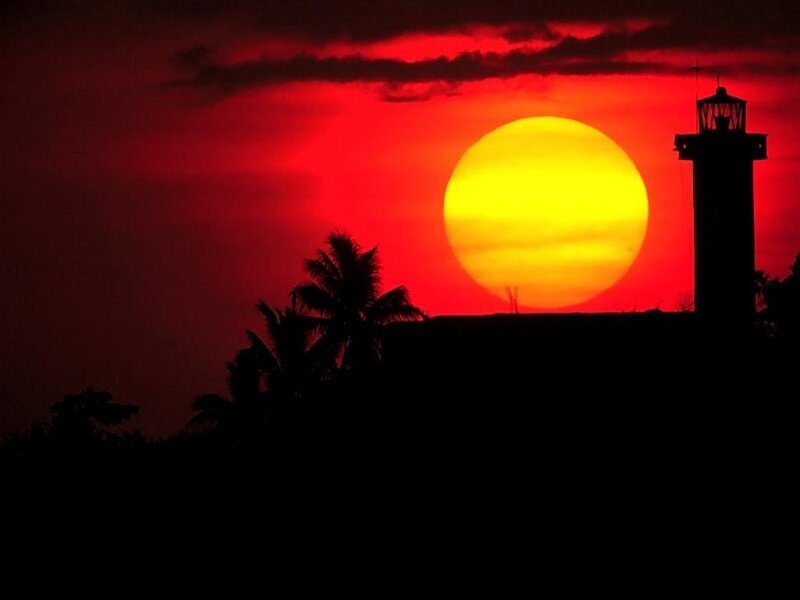 Lighthouse at Sunset — Red, Dramatic, Photograph, Sun
