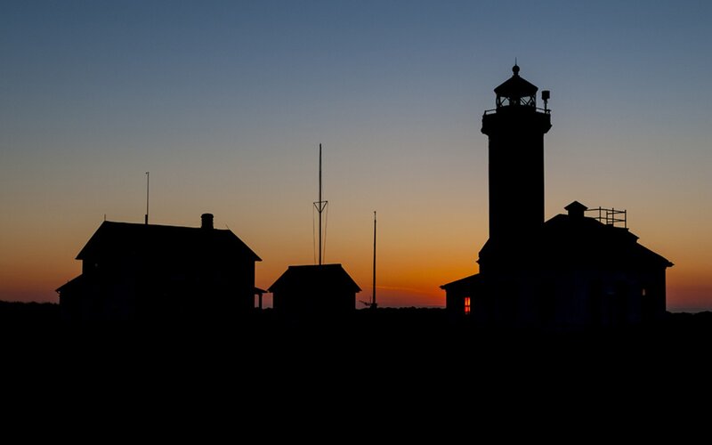 lighthouse at sunset silhouette