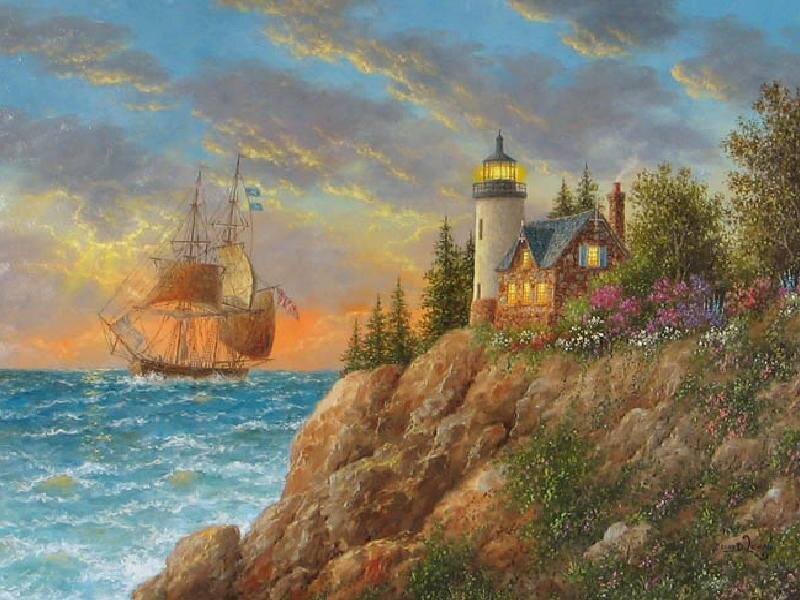 Lighthouse at sunset with ship