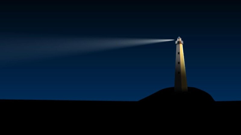 lighthouse beam at night