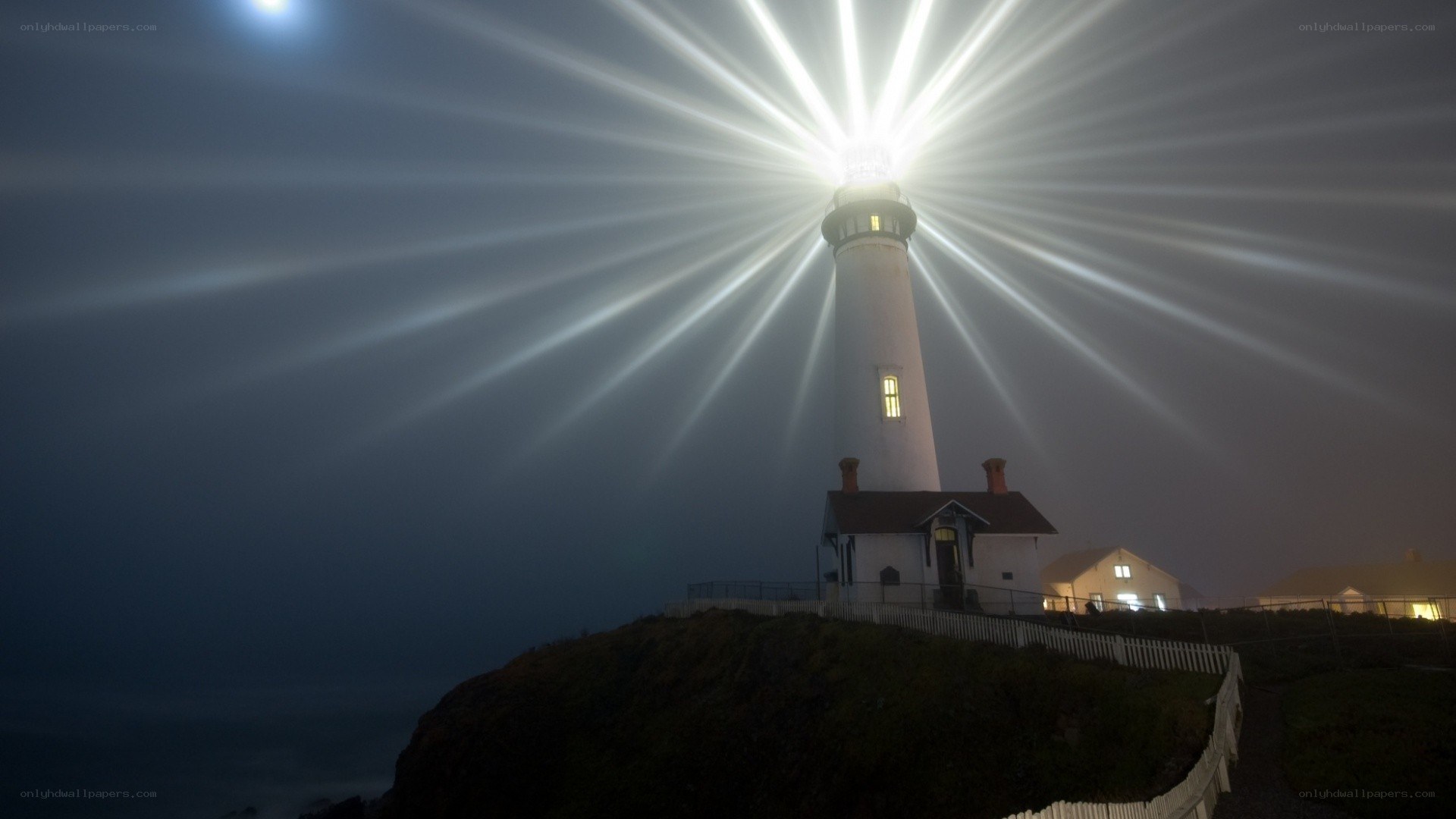 lighthouse beam at night