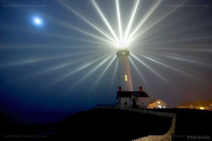 Lighthouse beam at night