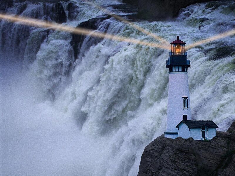 Lighthouse by a waterfall