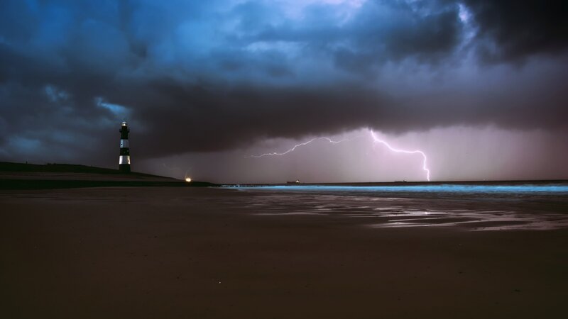 Lighthouse During Storm — Blue
