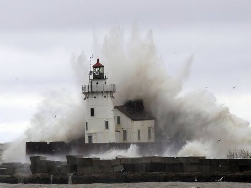 Lighthouse Hit by Wave