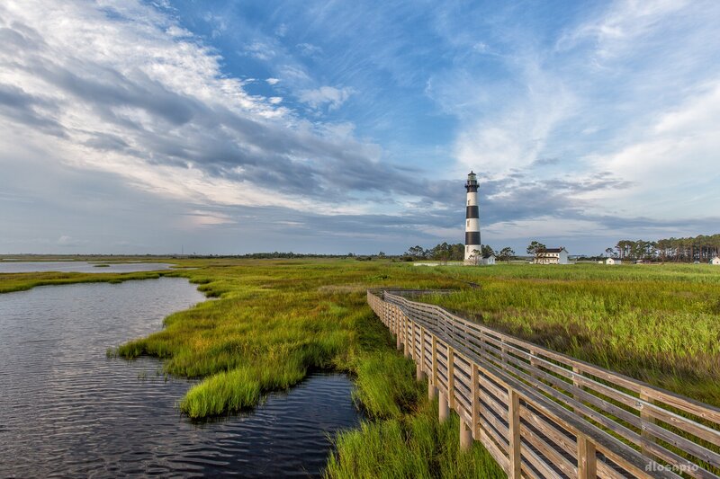 Lighthouse in Marshland — Green, Serene