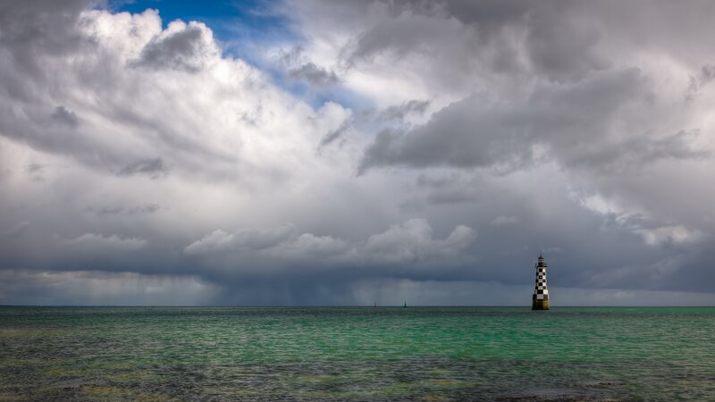 Lighthouse in Ocean — Gray