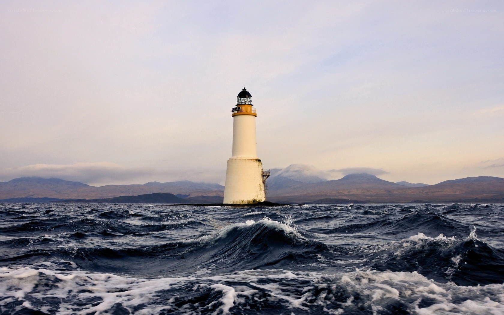 Lighthouse in rough seas