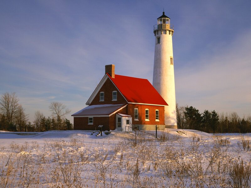 Lighthouse in snowy landscape