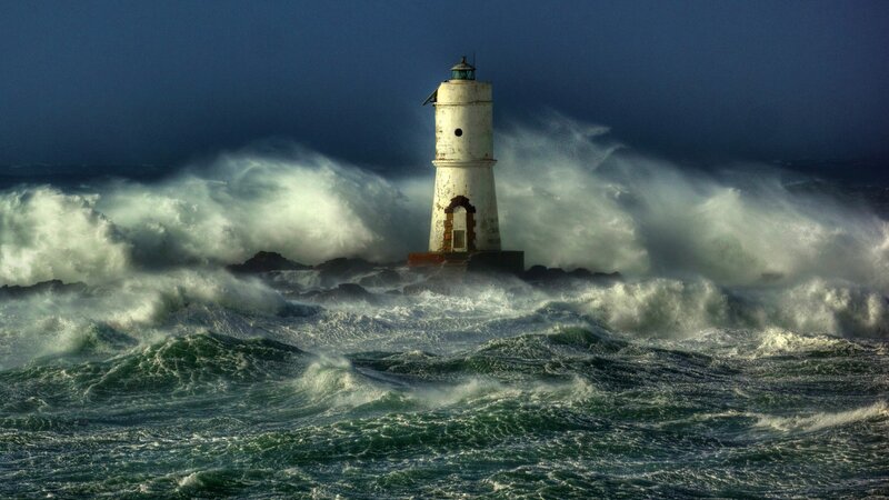 Lighthouse in Storm — Blue, Dramatic, Night, Photograph, Ocean, Waves, Rocks