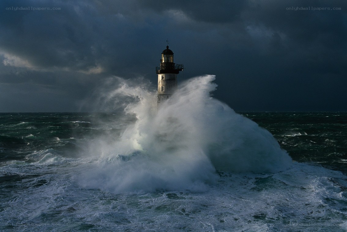 Lighthouse in stormy sea