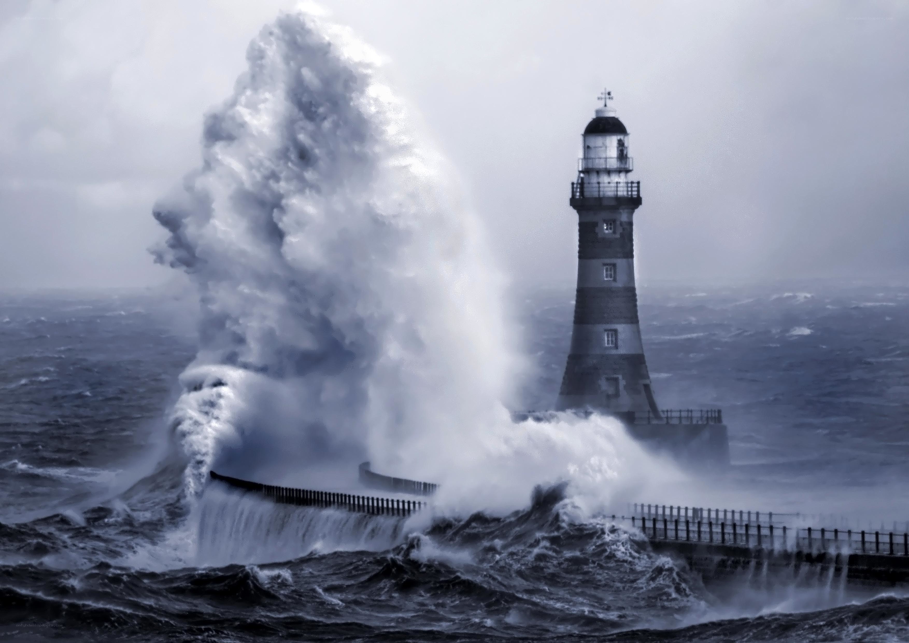 Lighthouse in stormy sea