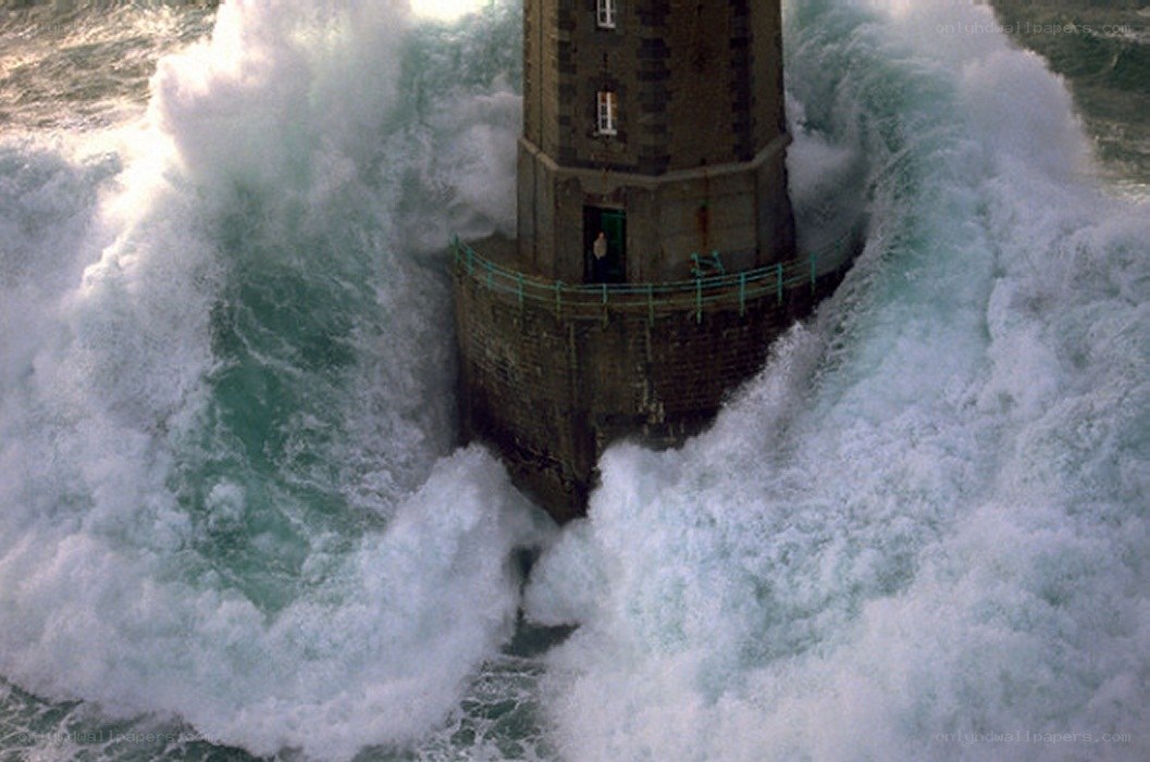 Lighthouse in stormy sea