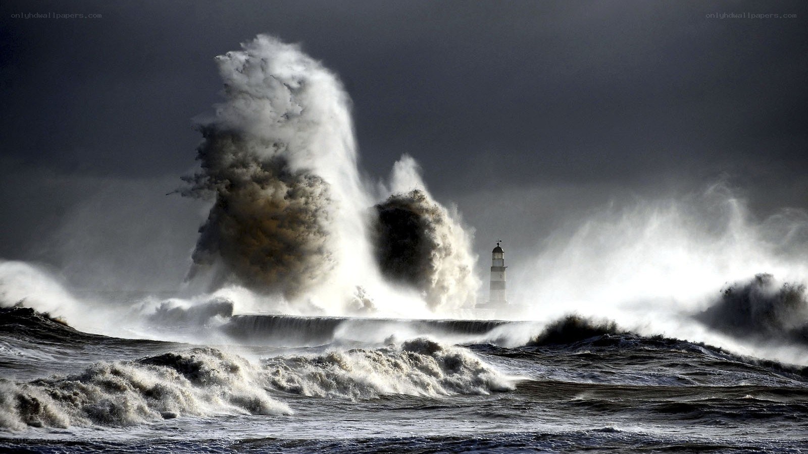 Lighthouse in stormy sea