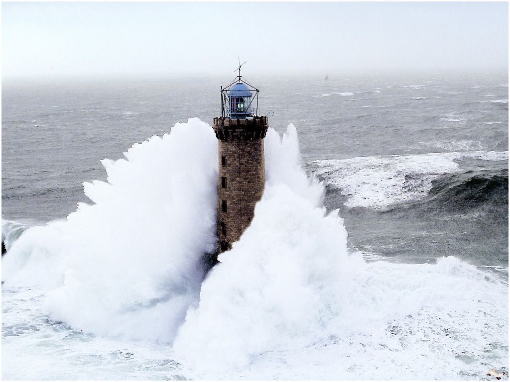 Lighthouse in stormy sea
