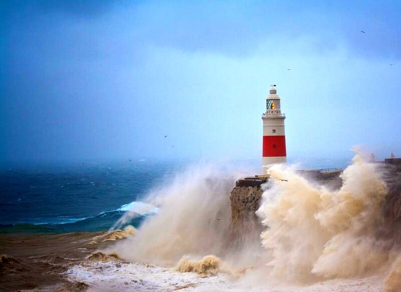 Lighthouse in stormy sea