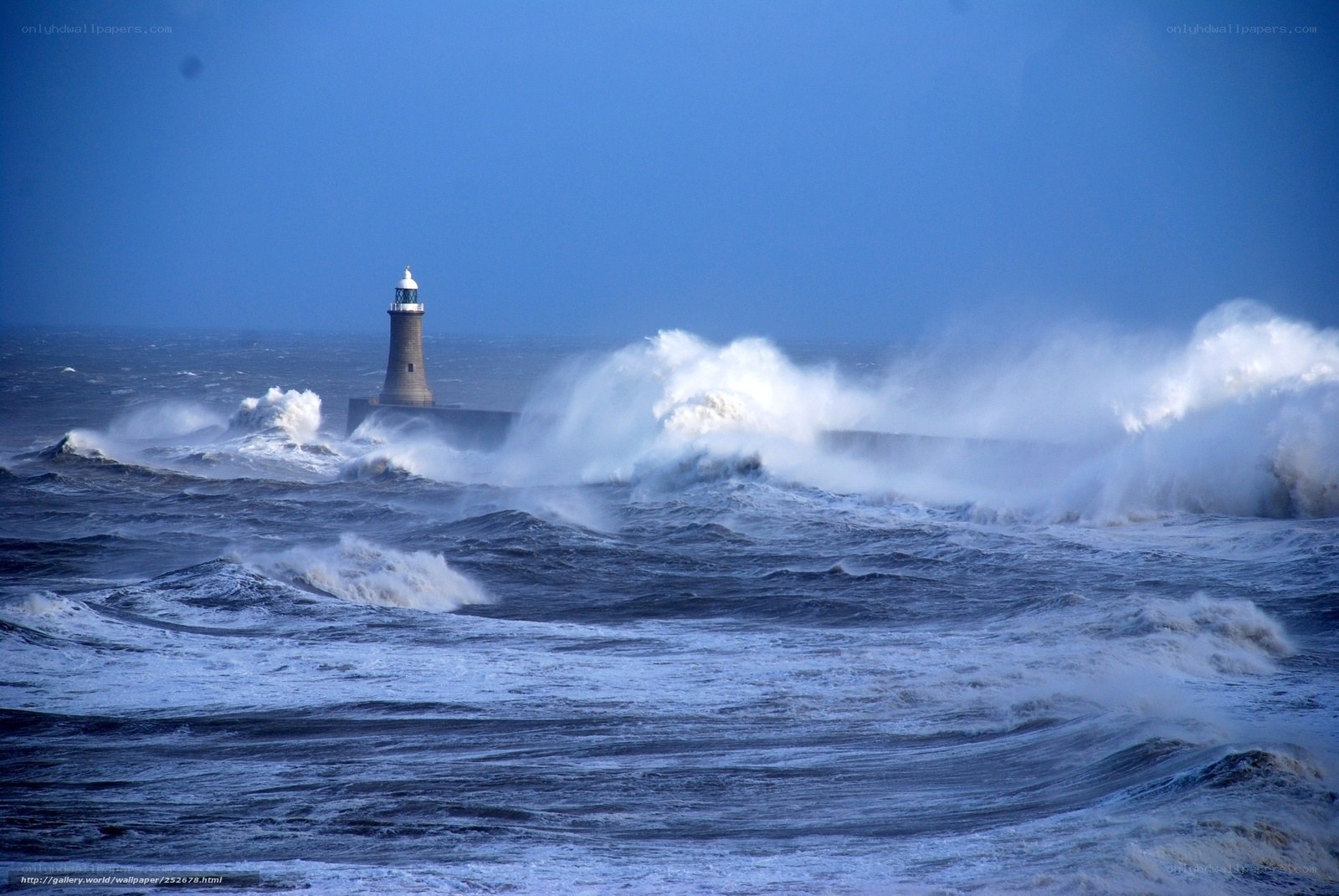 Lighthouse in stormy sea