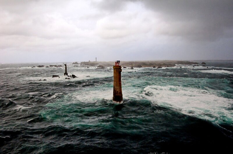Lighthouse in Stormy Sea — Gray, Dramatic, Photograph
