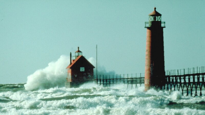 Lighthouse in stormy waves