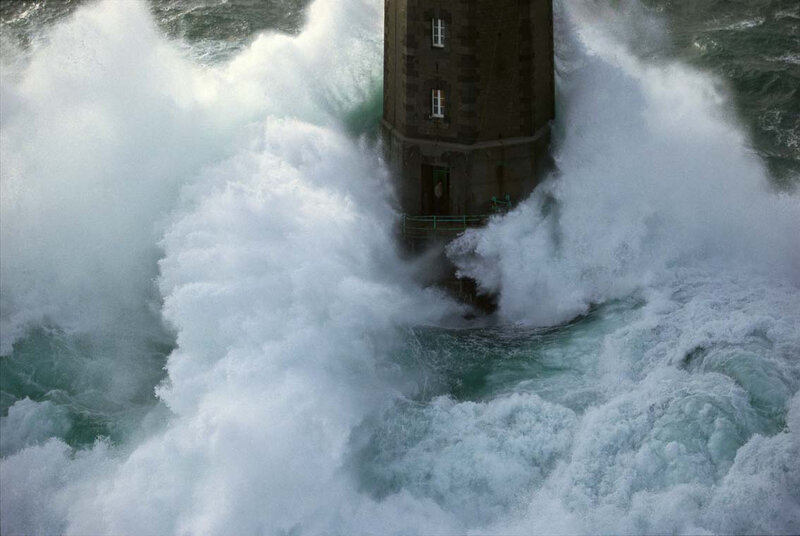 Lighthouse in stormy waves