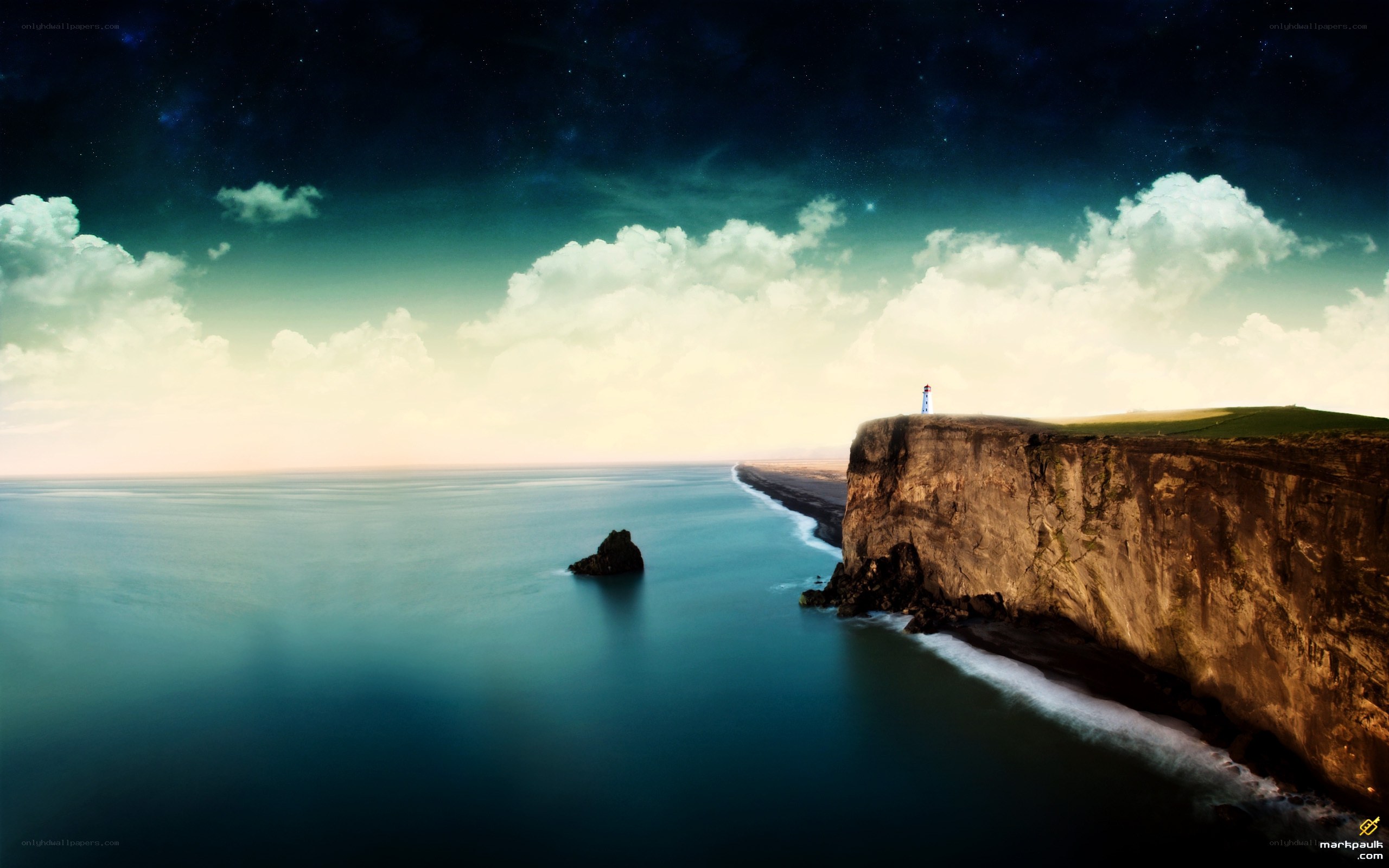 Lighthouse on a cliff at night