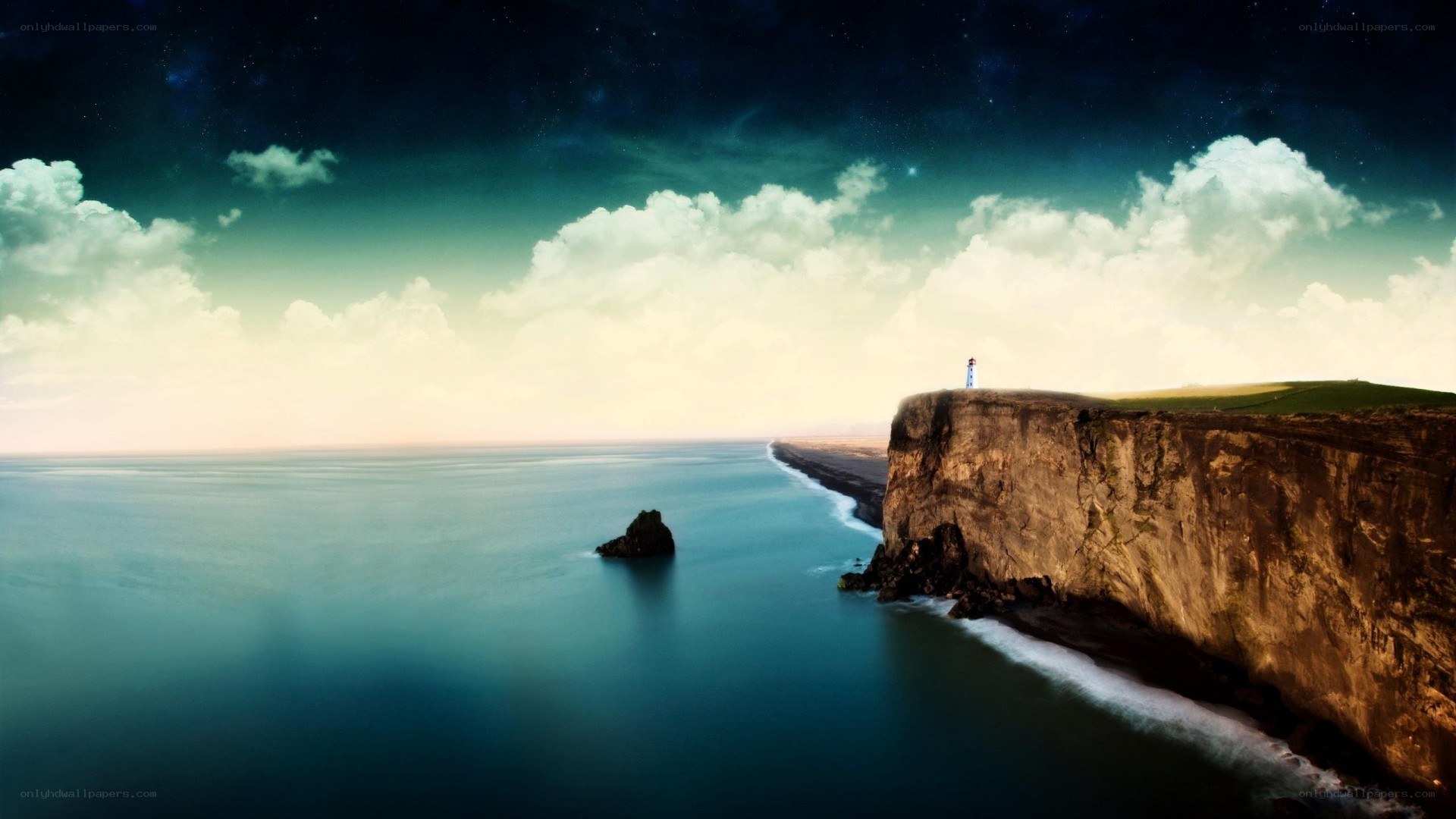 Lighthouse on a cliff at night