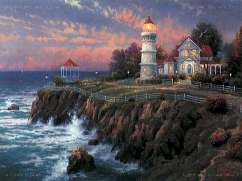 Lighthouse on a cliff at sunset