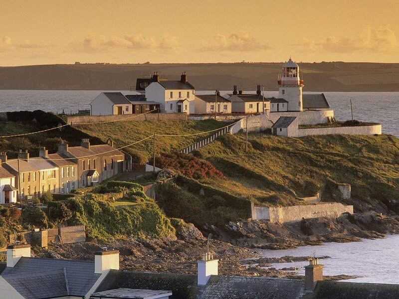 Lighthouse on a coastal hill