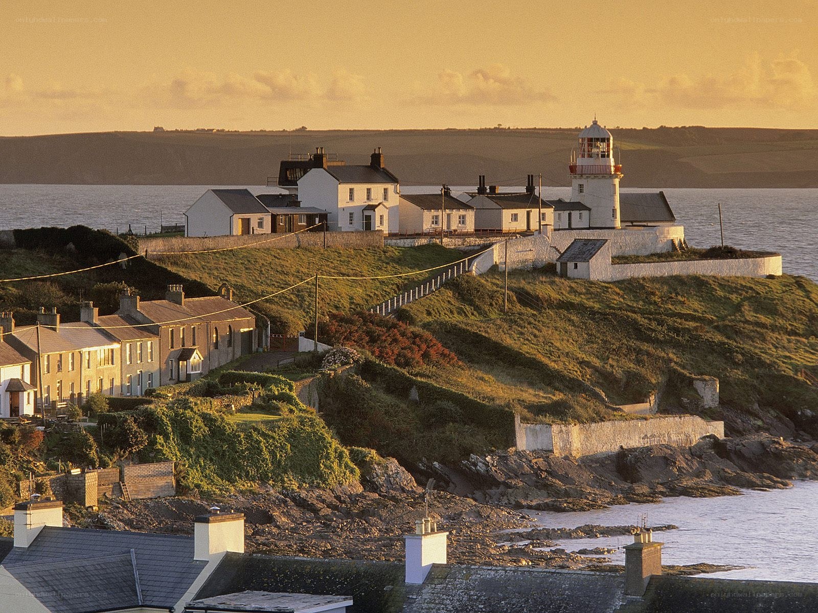 Lighthouse on a coastal hill
