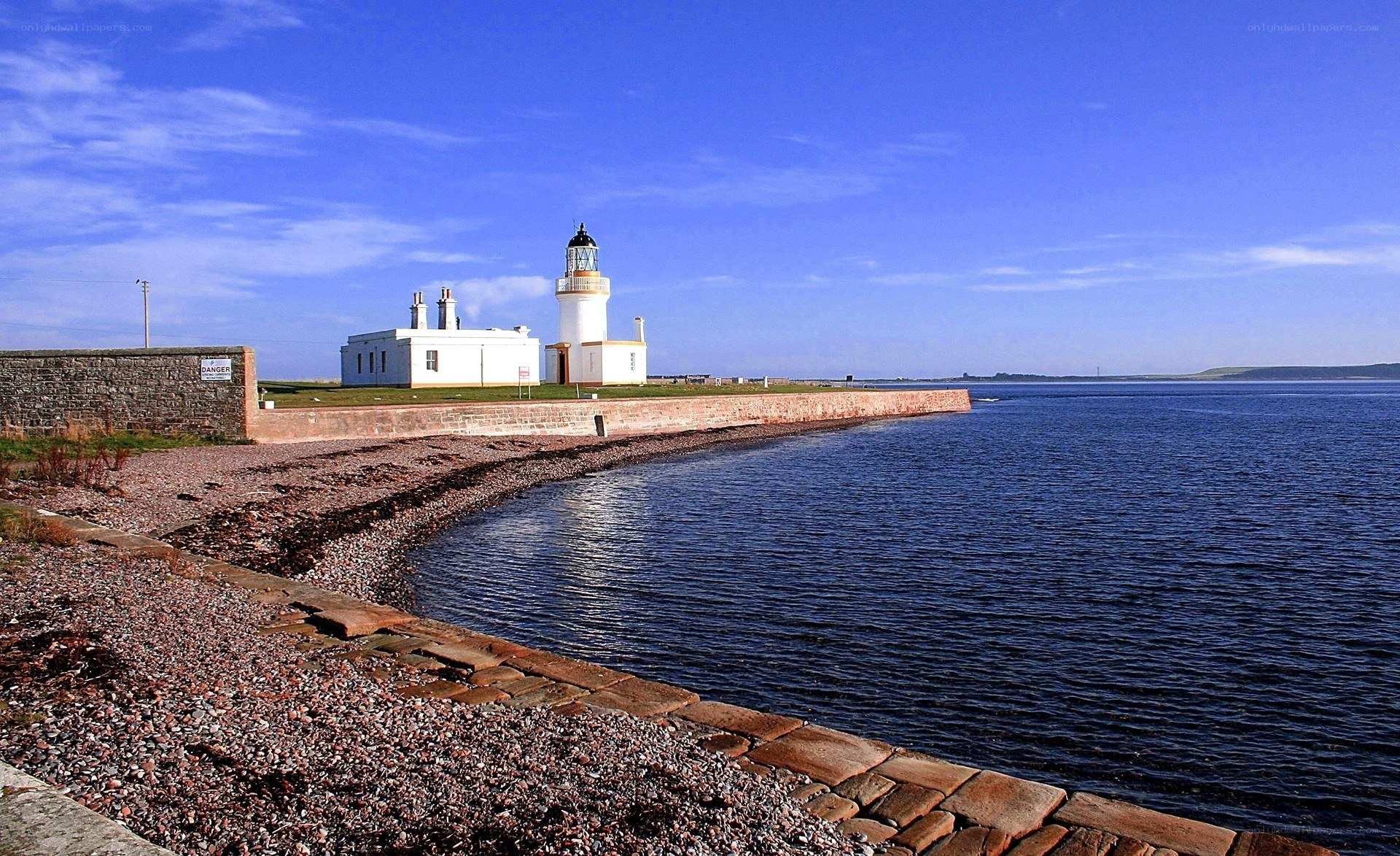 Lighthouse on a coastal pier