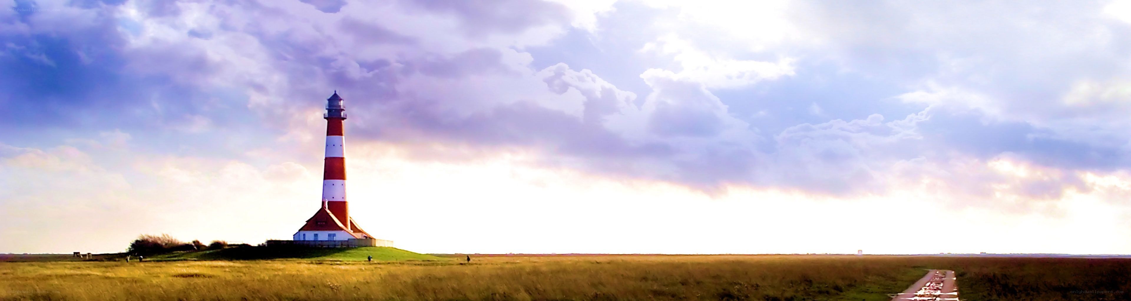 Lighthouse on a grassy hill