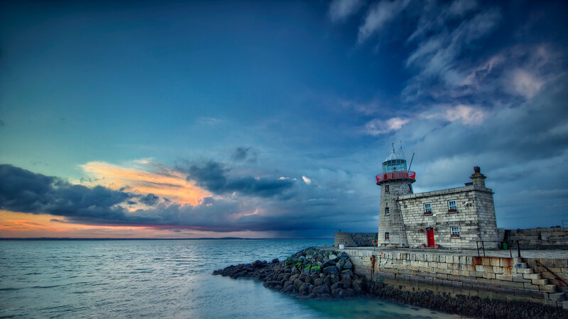 Lighthouse on a Pier — Blue, Dramatic, Sunset, Photograph
