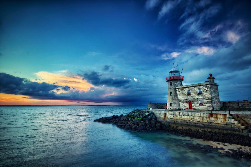 Lighthouse on a Pier — Blue, Dramatic, Sunset