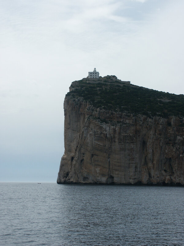 lighthouse on a rocky cliff