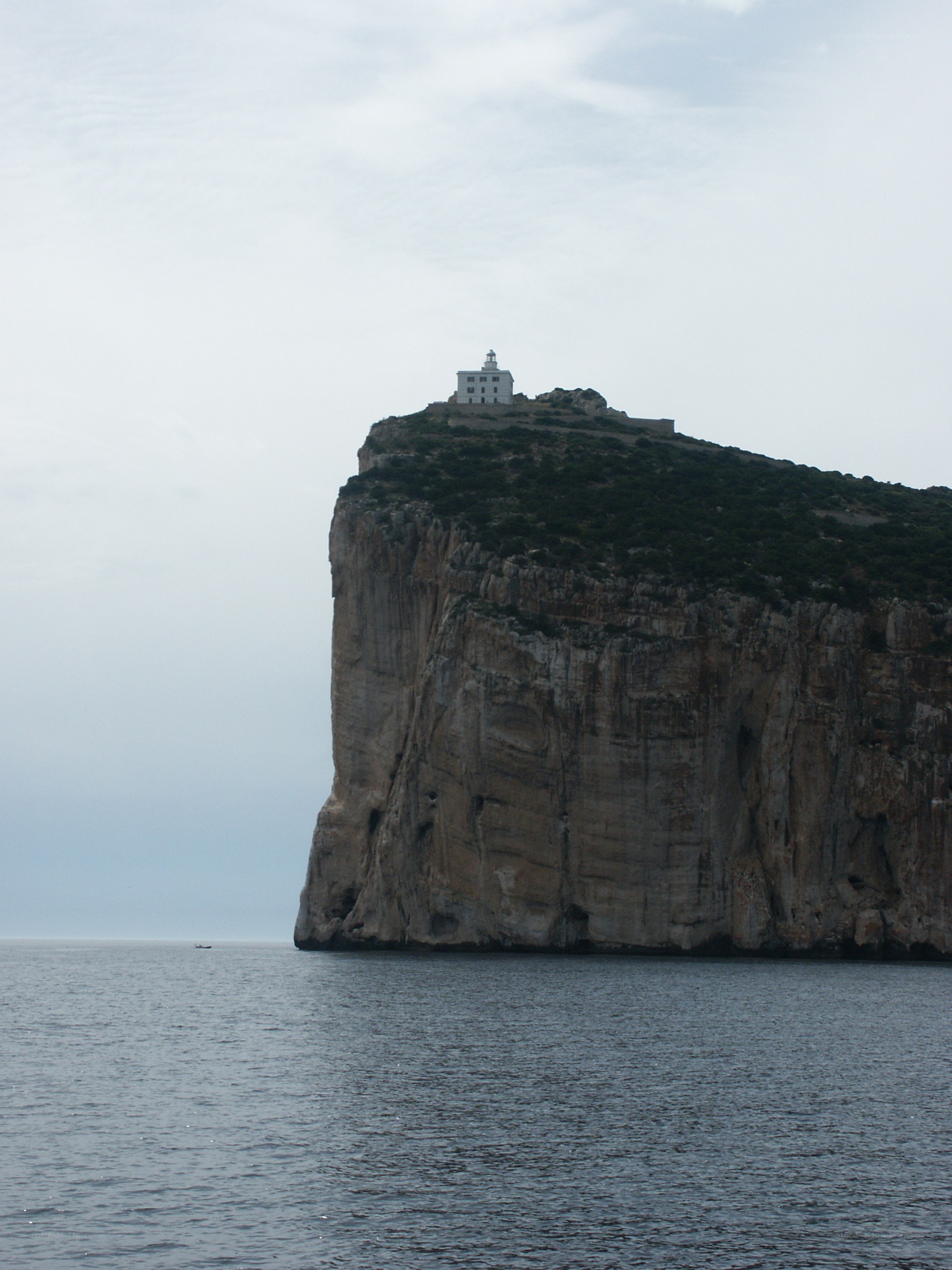 lighthouse on a rocky cliff