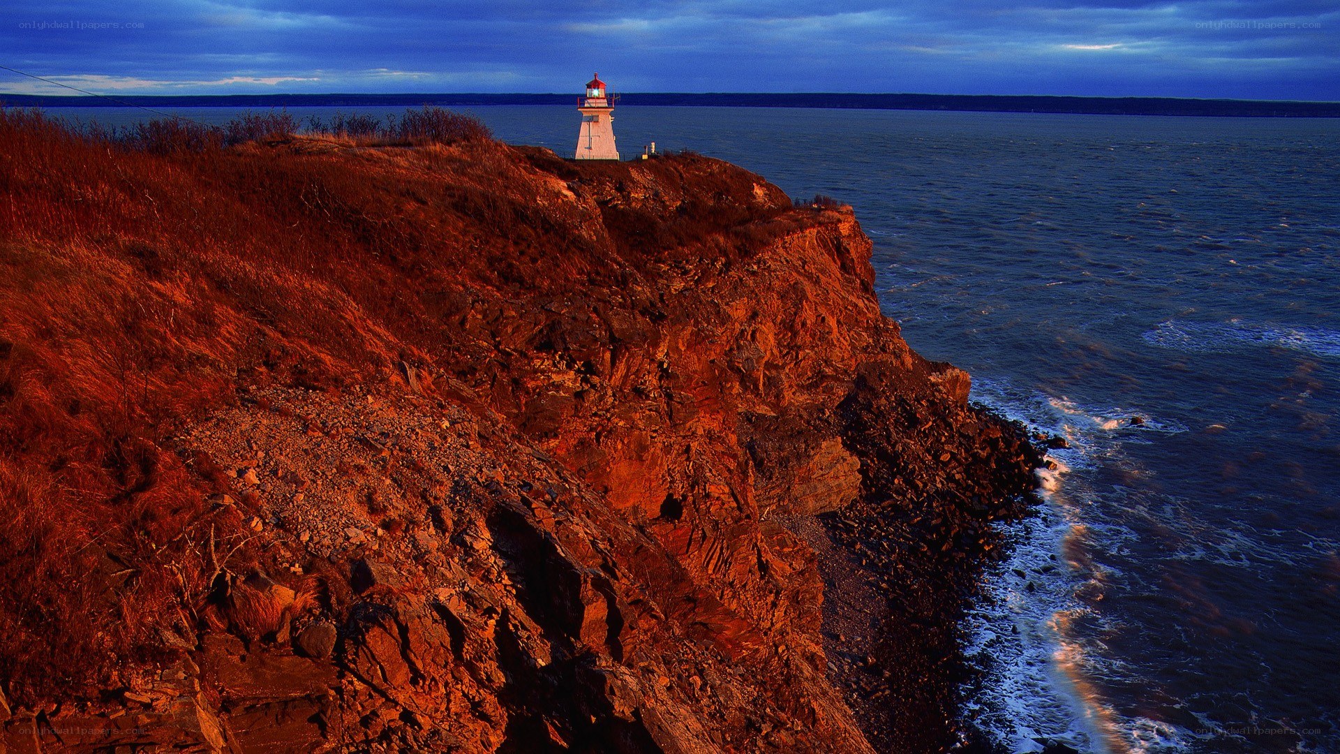 Lighthouse on a rocky cliff