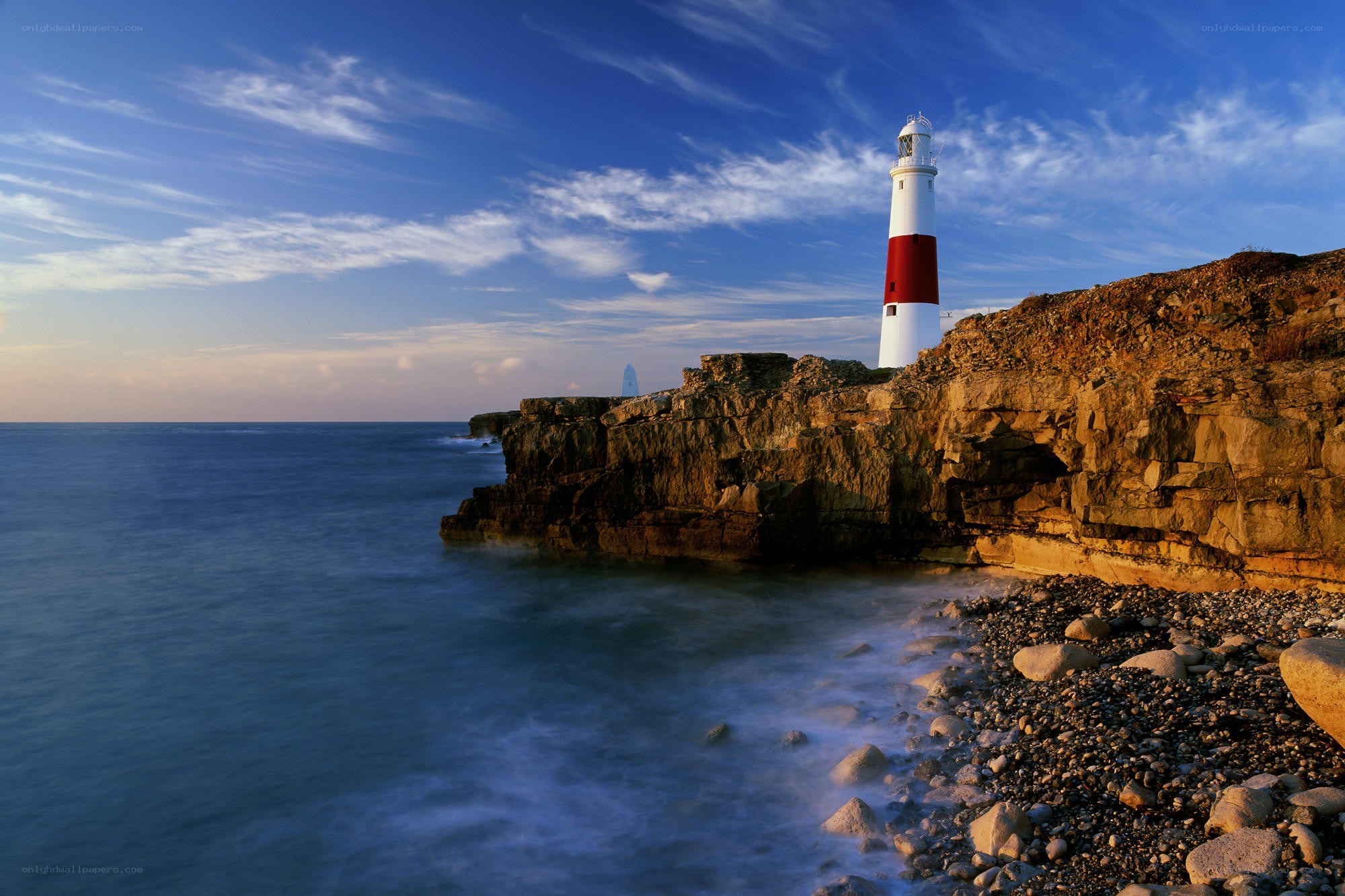 Lighthouse on a rocky cliff