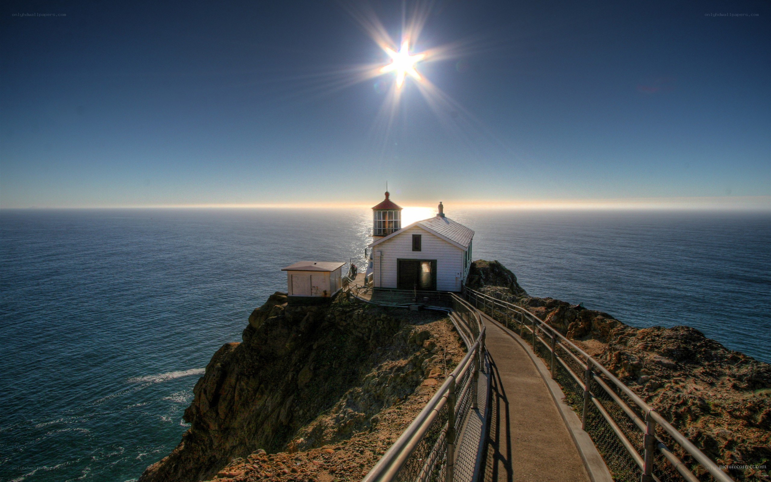 lighthouse on a rocky cliff