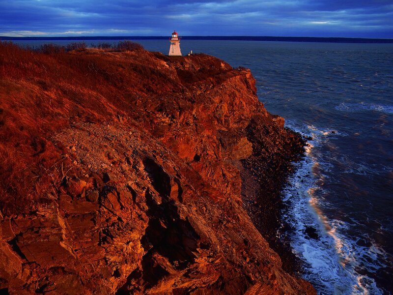 Lighthouse on a rocky cliff